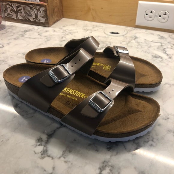 white and rose gold birkenstock